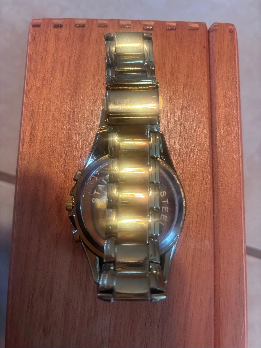 Geneva Gold-Tone Bracelet Watch with Black Bezel